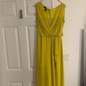 BCBGMaxazria yellow dress size 0. Only worn twice. Dry cleaned. Never altered.
